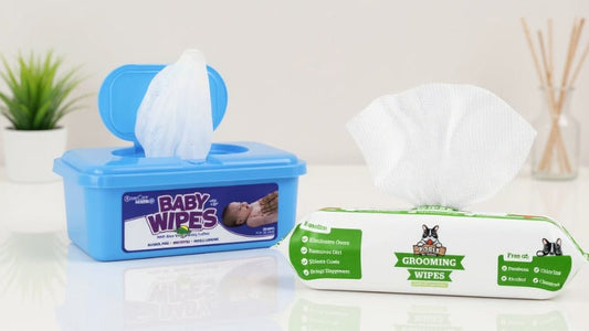 Baby wipes and grooming wipes containers placed on table.