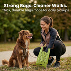 A dog owner holds a Pogi's tie-handle bag beside her dog on a walk. Strong bags for daily pickups.