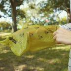 Loading a dispenser and using Pogi's regular poop bags on a walk.